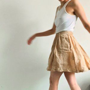cream full mini skirt